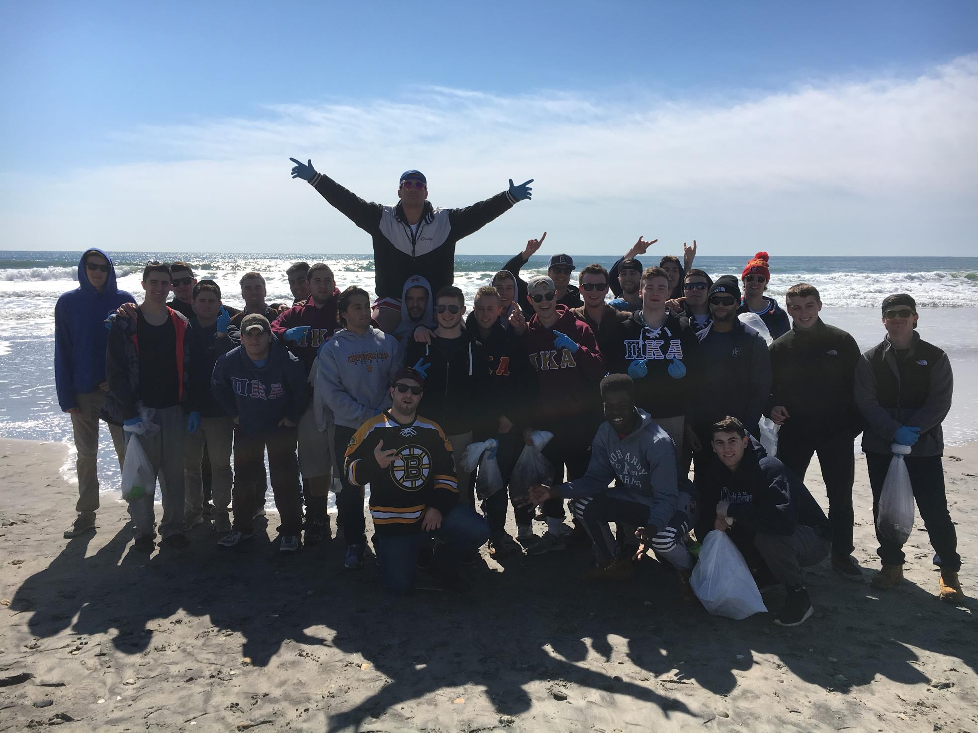 Kappa Iota Chapter Performs A Trash Clean Up On The Beach Photograph