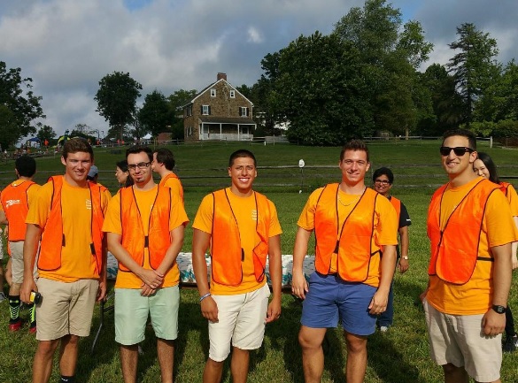 Five Mu Alpha Pikes Wearing Orange Vests Photograph