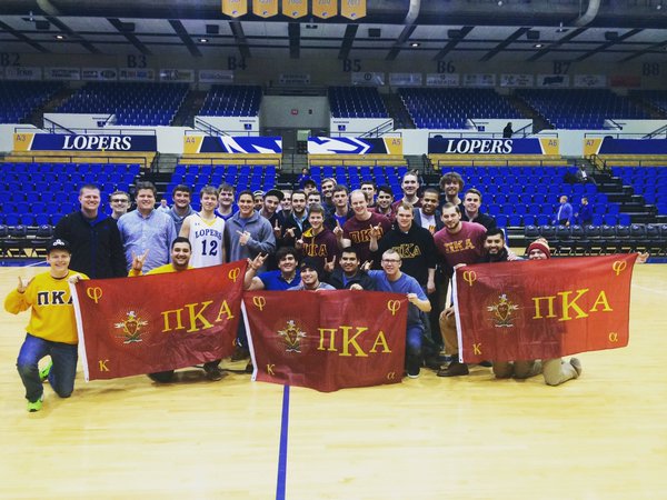 Group of Iota Gamma Chapter Pikes Holding Flags Photograph