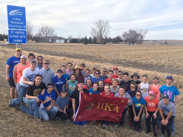Iota Gamma Pikes and Sorority Sisters Clean Up Trash Photograph