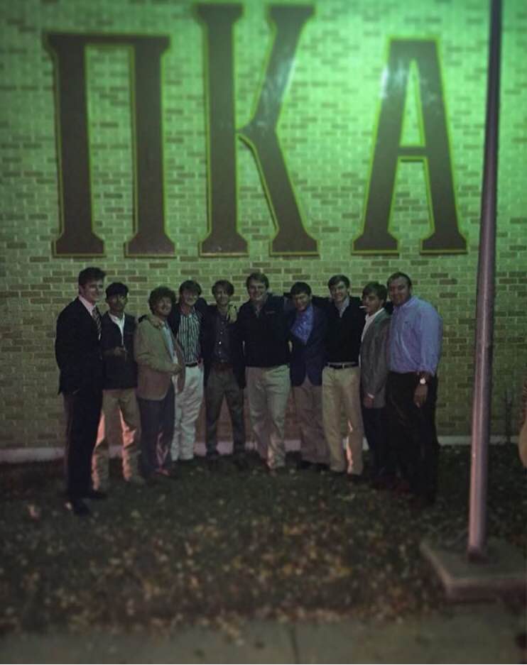 Eleven Zeta Beta Chapter Members Under The Fraternity Greek Letters Photograph