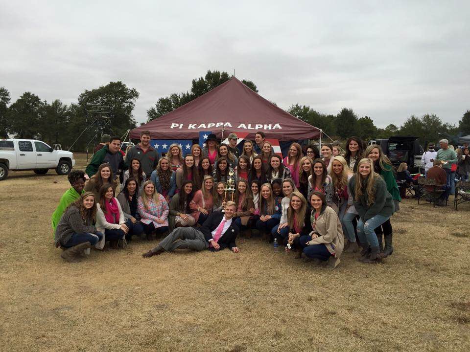 Group of Women Outside a Pi Kappa Alpha Tent Photograph