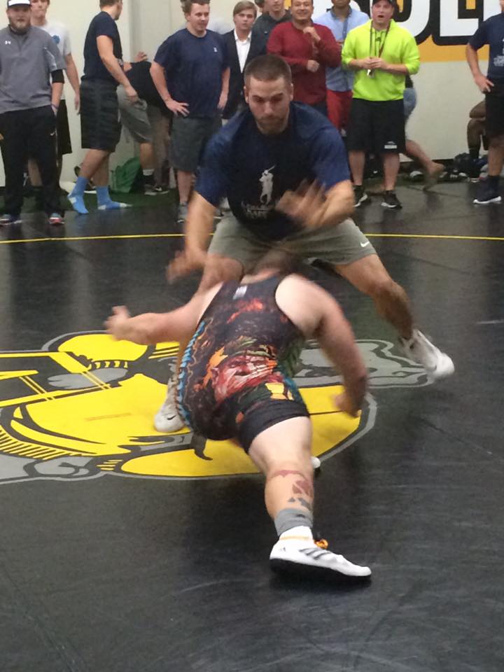 Two Unidentified Individuals Wrestling Photograph