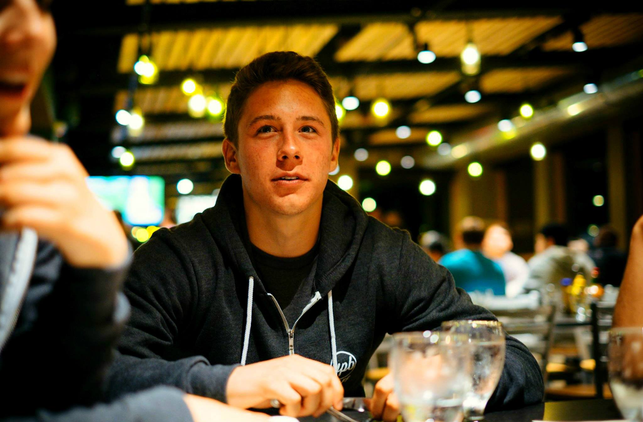 An Unidentified Lambda Delta Chapter Member At A Restaurant Photograph