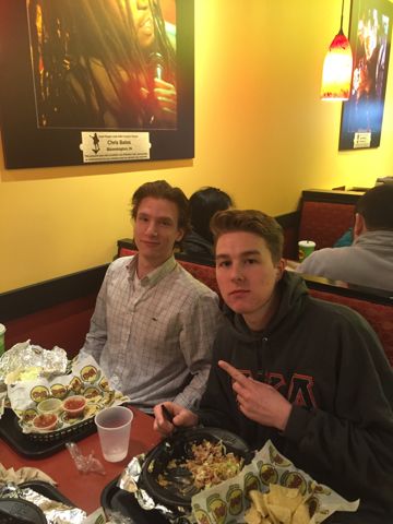 Two Unidentified Theta Mu Chapter Members At A Restaurant Photograph
