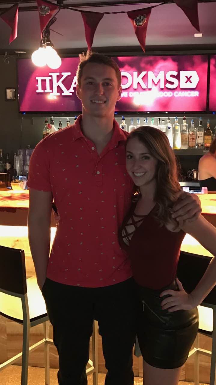 Unidentified Theta Mu Chapter Member and Date at DKMS Event Photograph