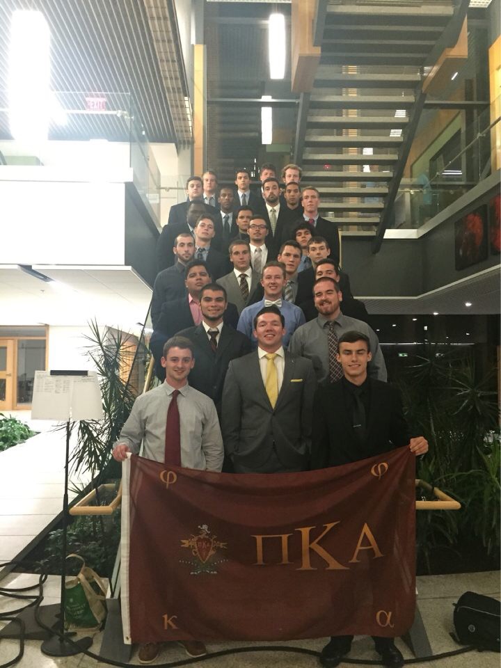 Mu Xi Chapter Members with a PiKA Flag Photograph