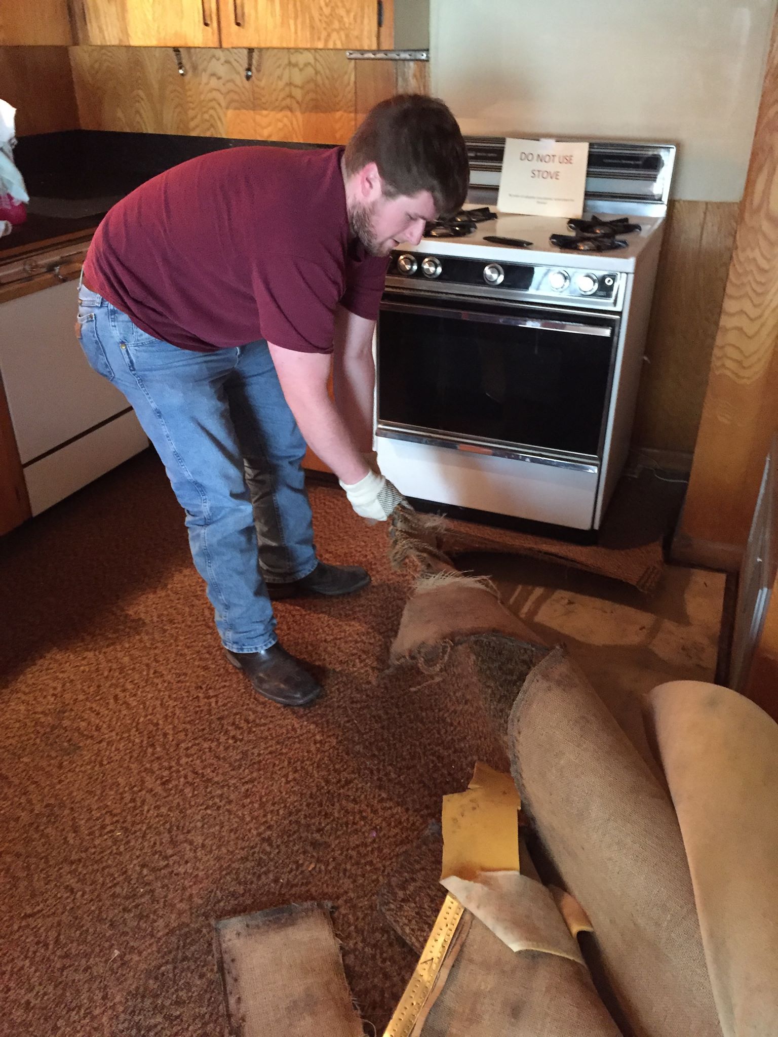 An Unidentified Zeta Omega Chapter Member Ripping Up Carpet Photograph