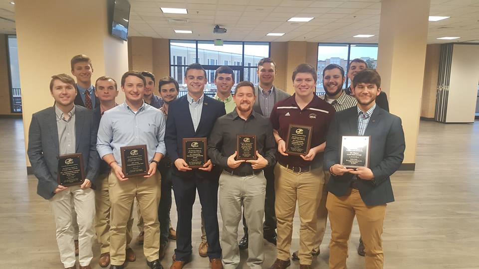 Eta Omicron Chapter Members Hold Six Awards Photograph