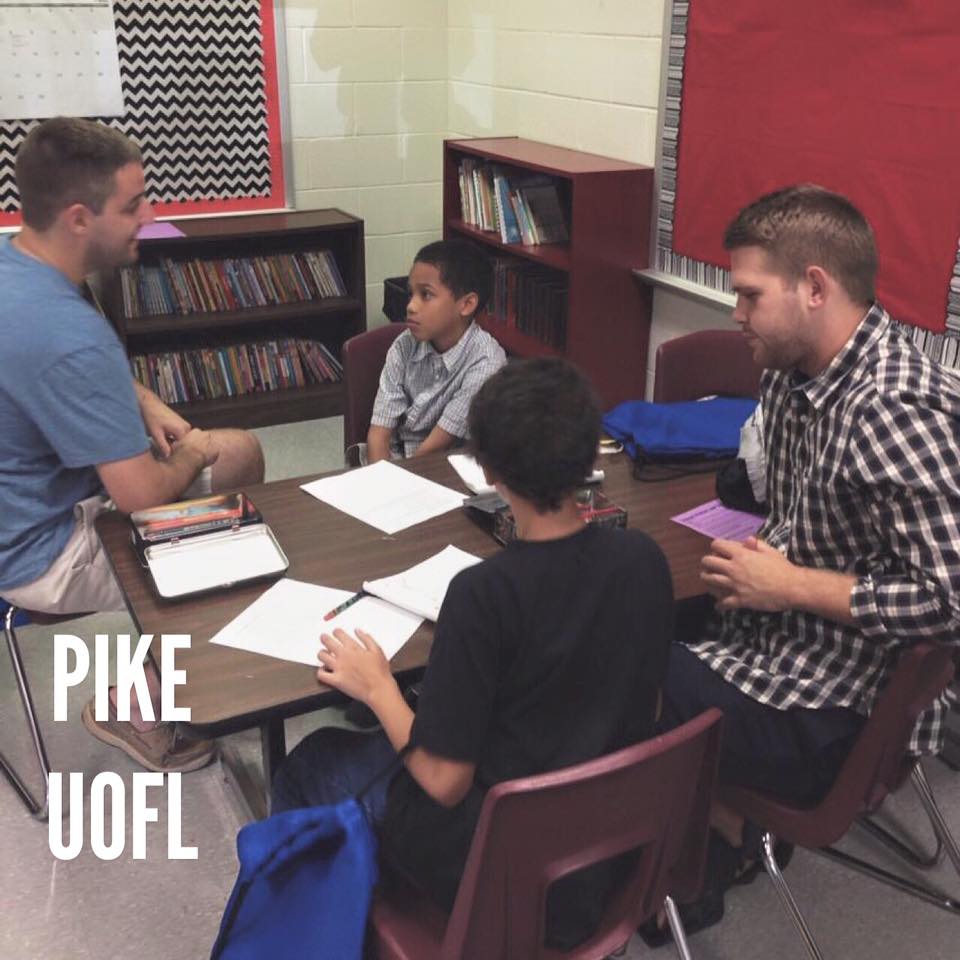 Two Kappa Zeta Chapter Members Tutoring Kids Photograph, September 8, 2015