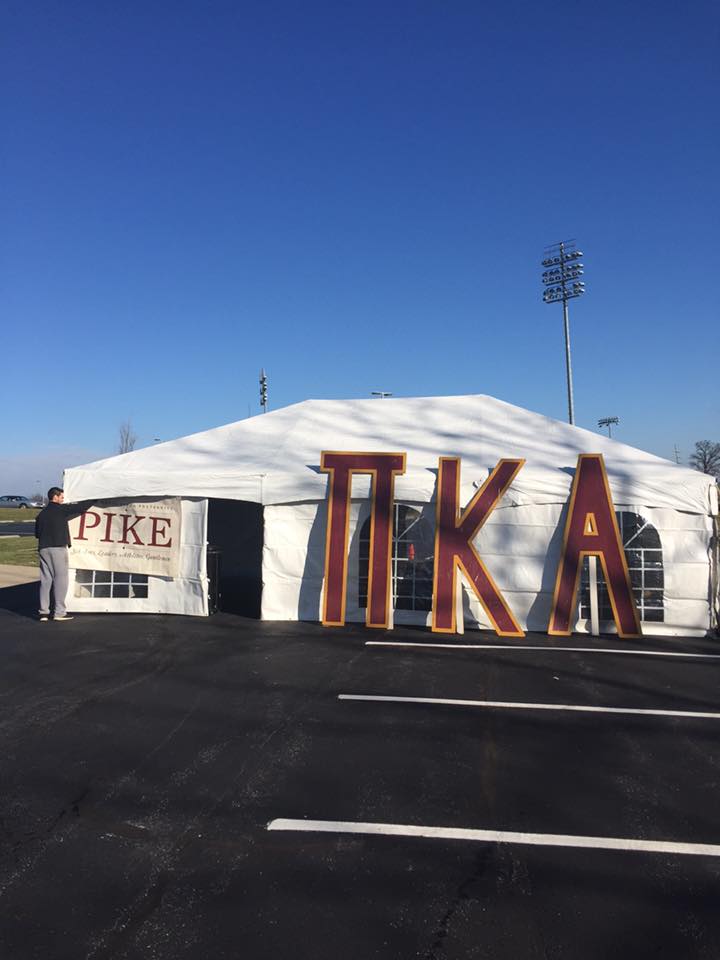 Eta Rho Chapter Setting Up A PIKE Event Tent Photograph
