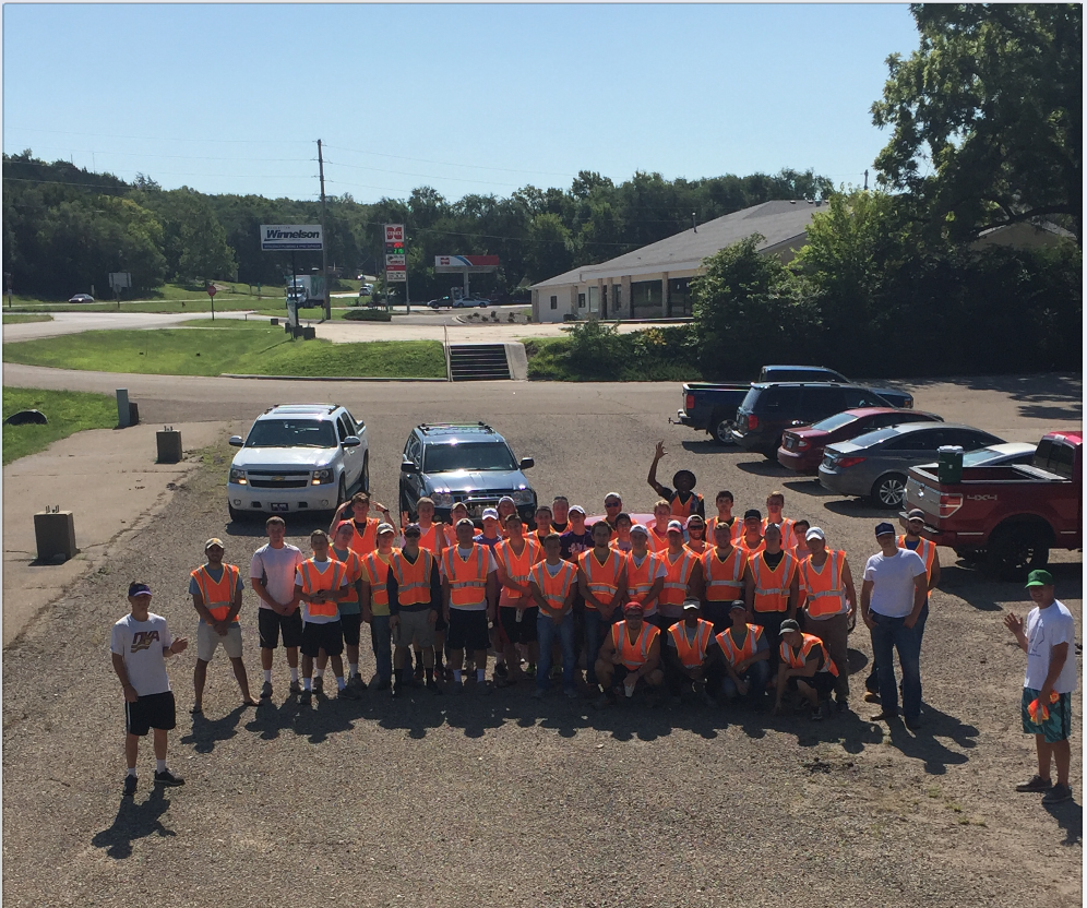 Alpha Omega Chapter Members Volunteer at an Event Photograph
