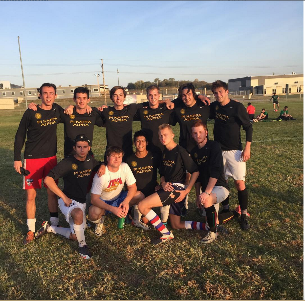 Alpha Omega Chapter Members Play Soccer Photograph
