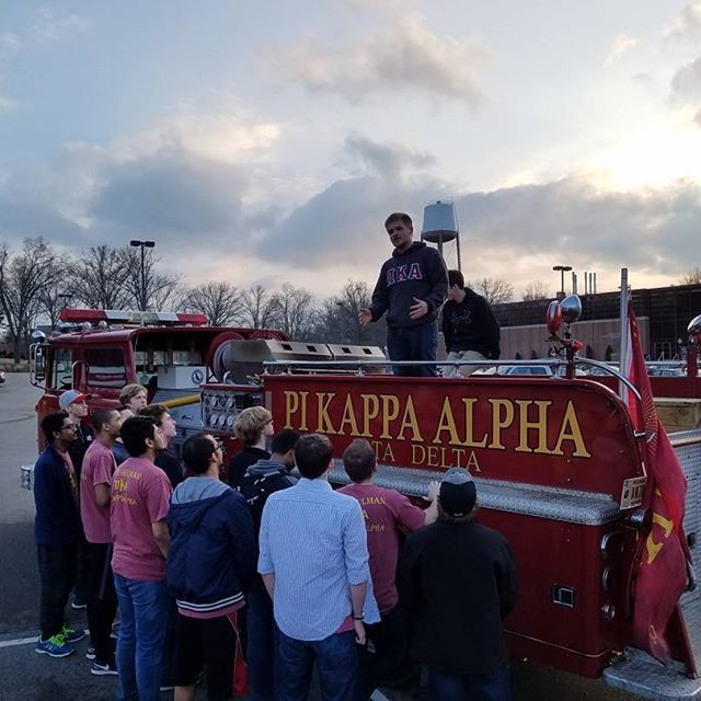Iota Delta Chapter Members and Their Chapter Fire Truck on Bid Day Photograph