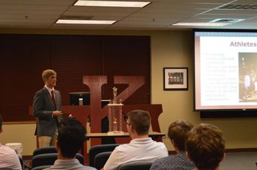 Theta Kappa Chapter Member Giving Presentation Photograph