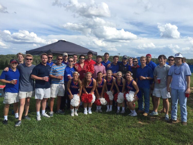 Eta Sigma Chapter Members with Cheerleaders Photograph
