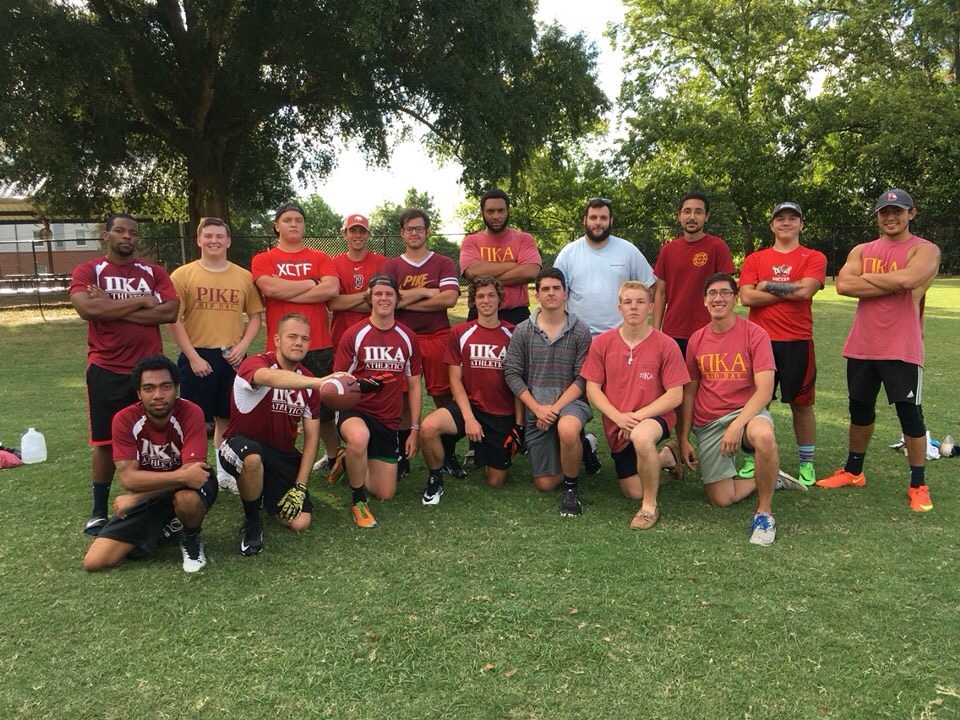 Mu Iota Chapter Members Playing Football Photograph