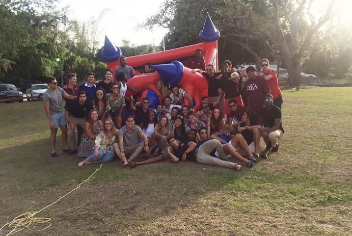 Zeta Sigmas and Friends Play with an Inflatable Bounce Castle Photograph