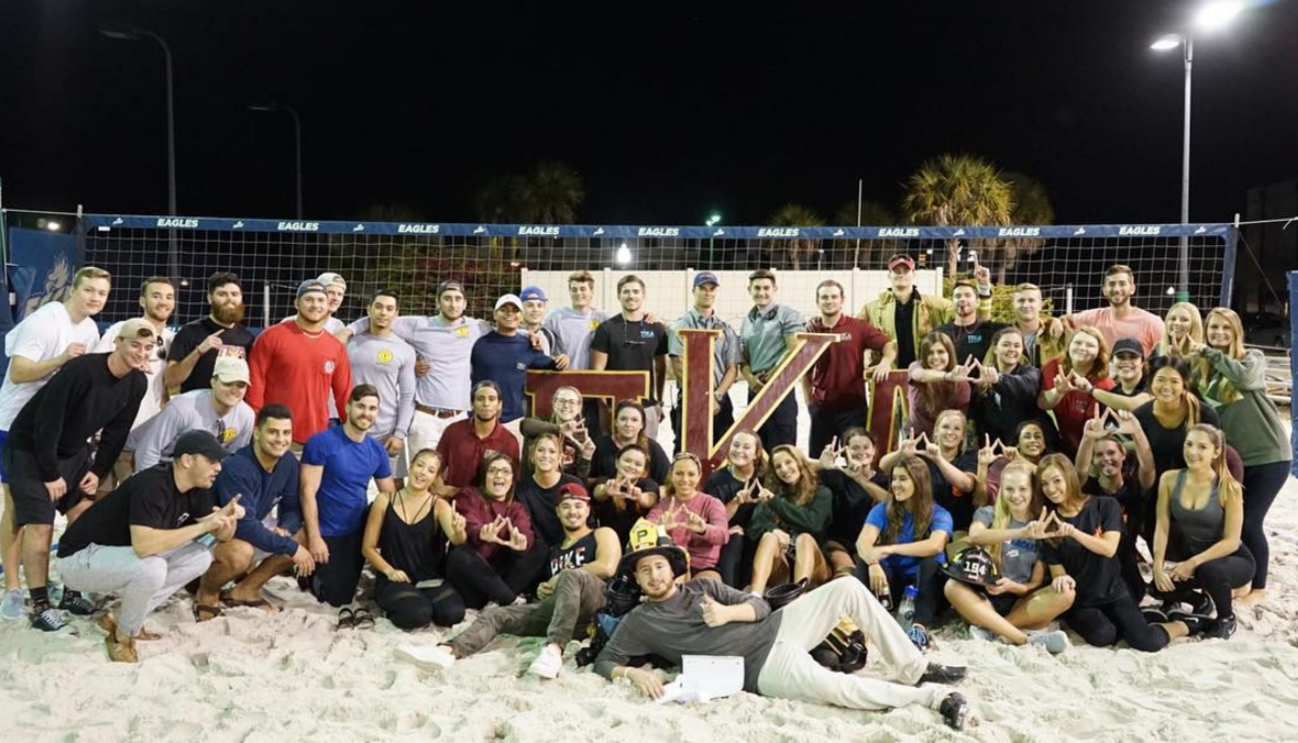 Lambda Xi Chapter Members On A Beach Volleyball Court Photograph