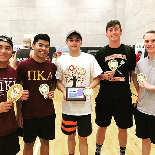 Espasters, Miller, Unidentified, Hull, Calvert Holding Nametags and Plaque Photograph, c. 1997