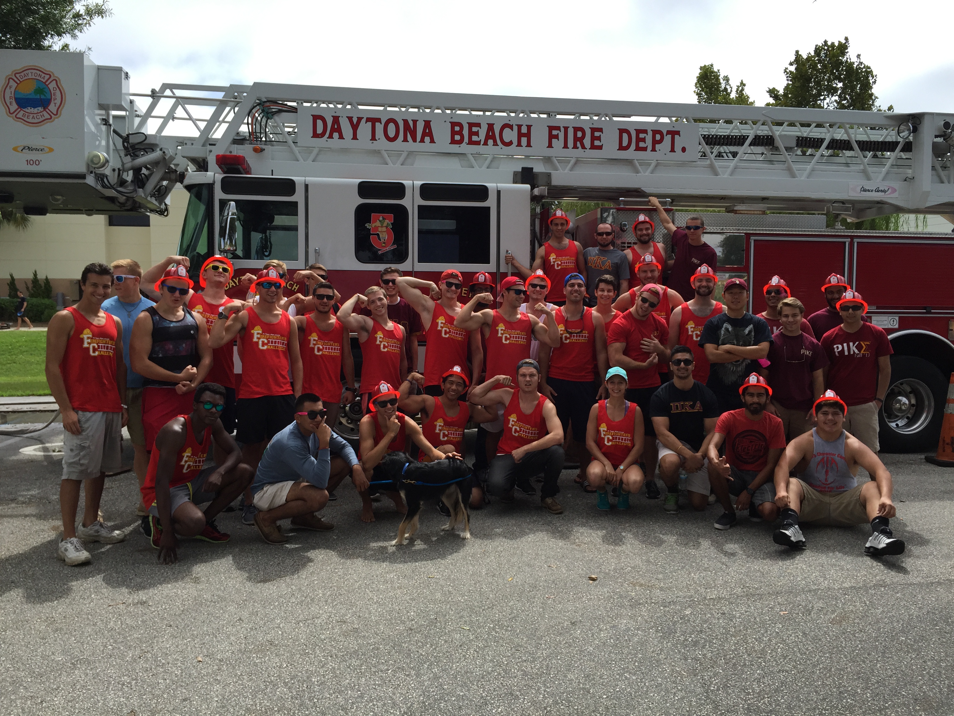 Lambda Mu Chapter Members With A Fire Truck Photograph