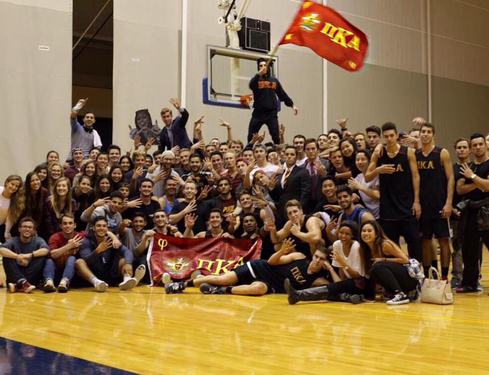 Kappa Phi Chapter Members Gather in a Gymnasium Photograph