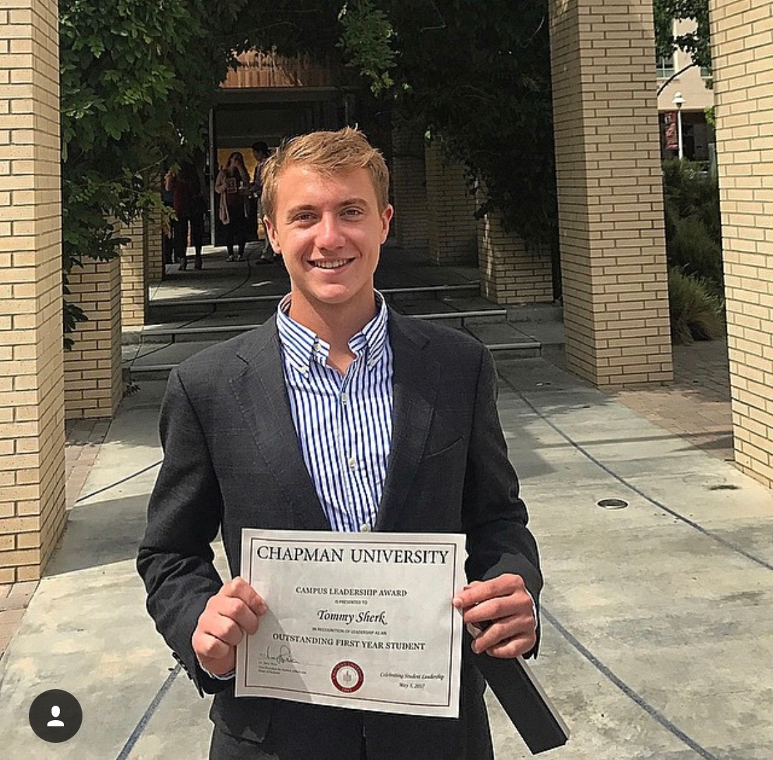 Tommy Sherk Receives a Campus Leadership Award Photograph, May 2017