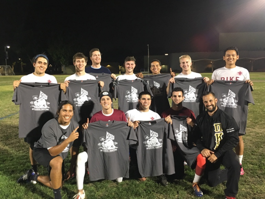 Mu Epsilon Athletic Team Holding Up T-Shirts Photograph