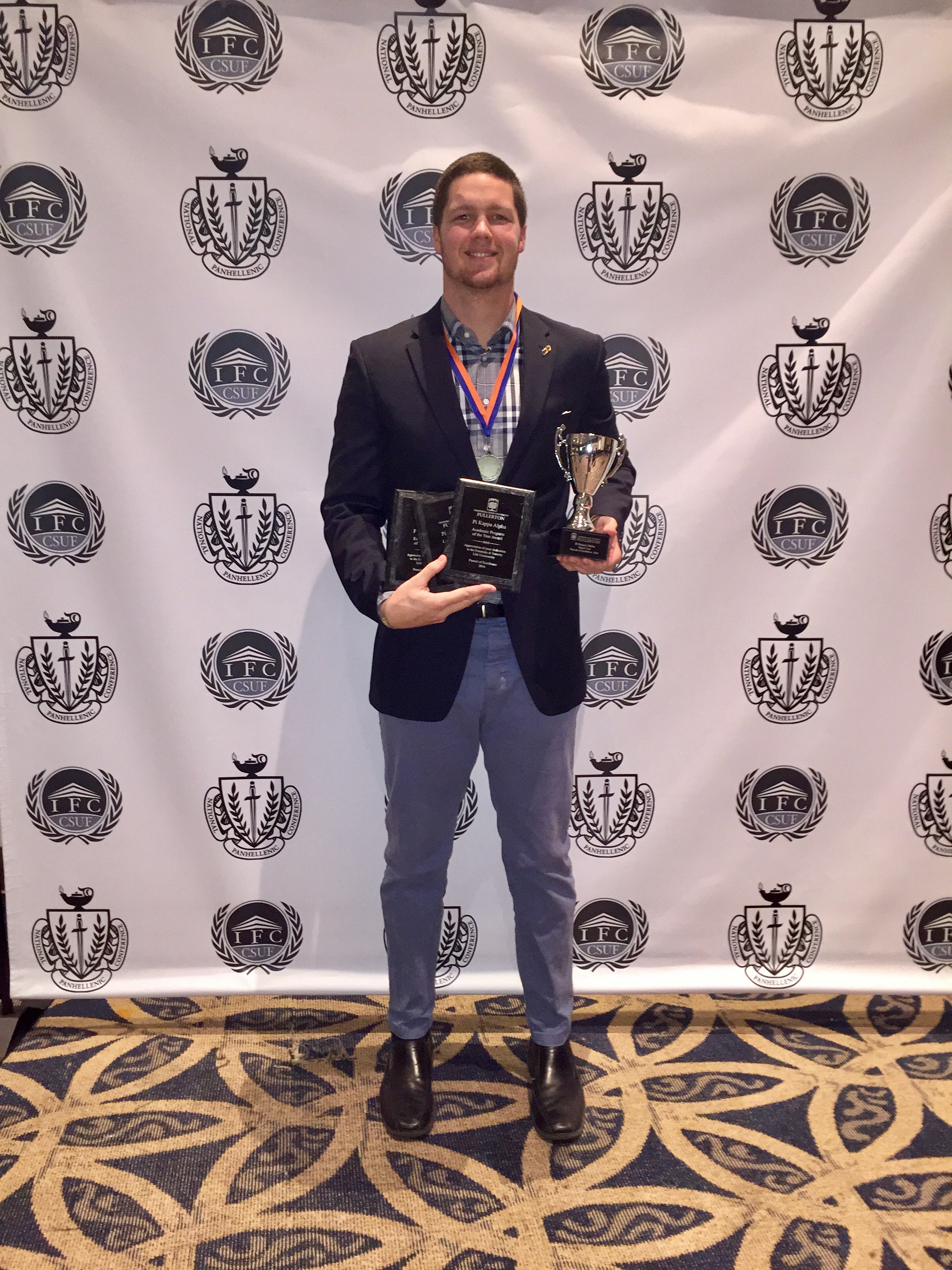 An Unidentified Mu Epsilon Chapter Member with Awards Photograph