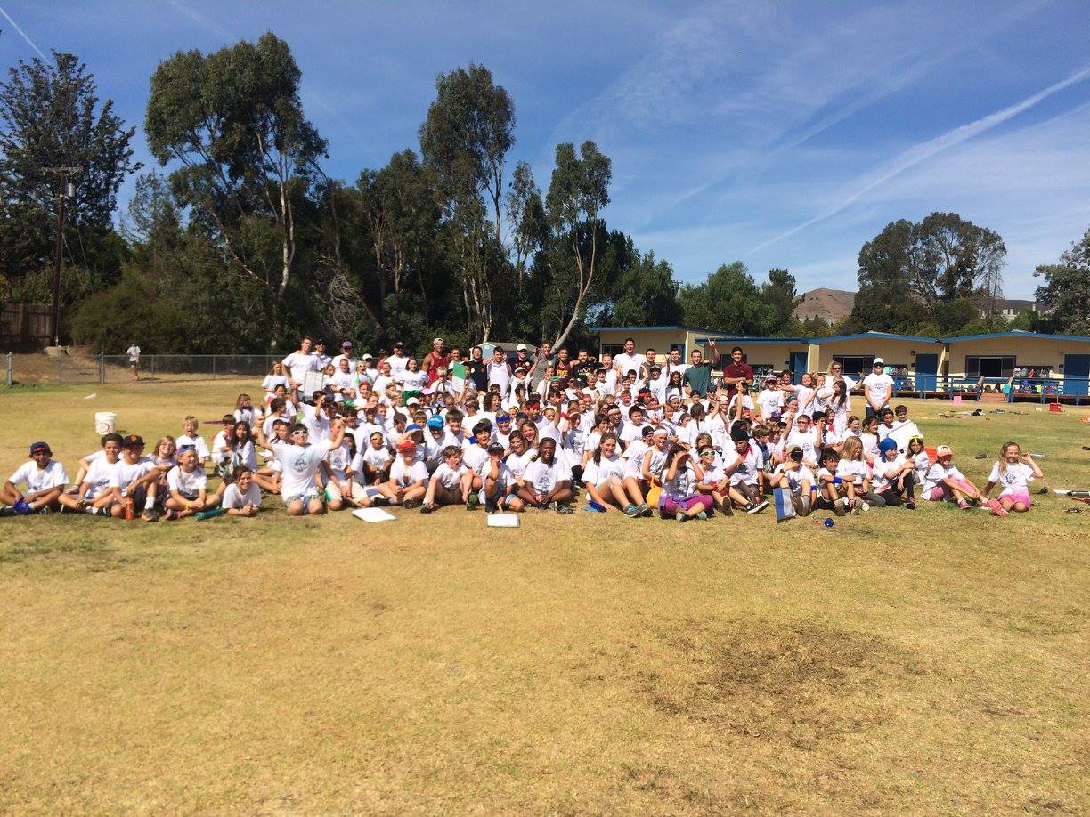 Iota Theta Chapter Members Tutoring Elementary Kids Photograph