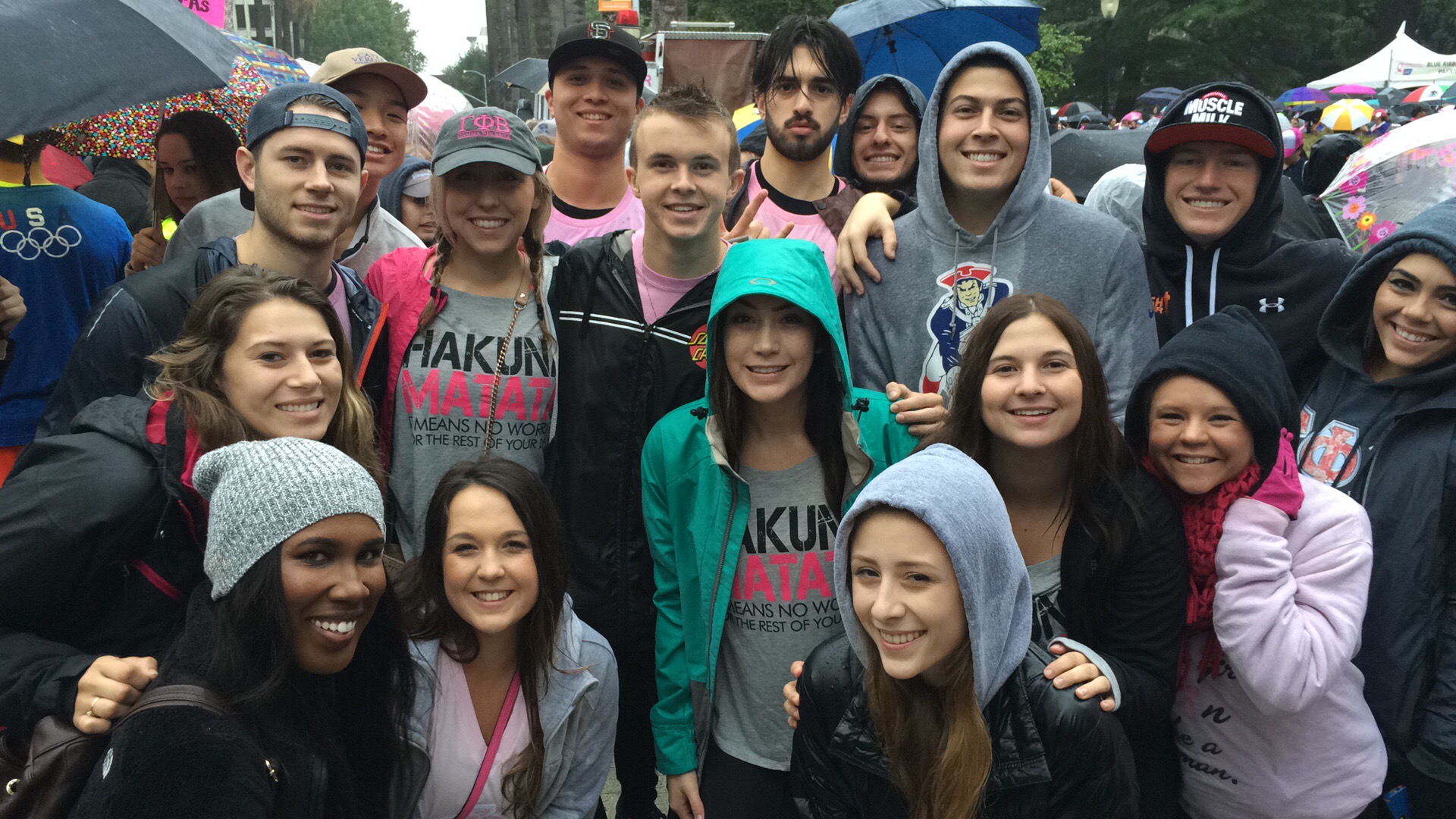 College Students at an Event in the Rain Photograph