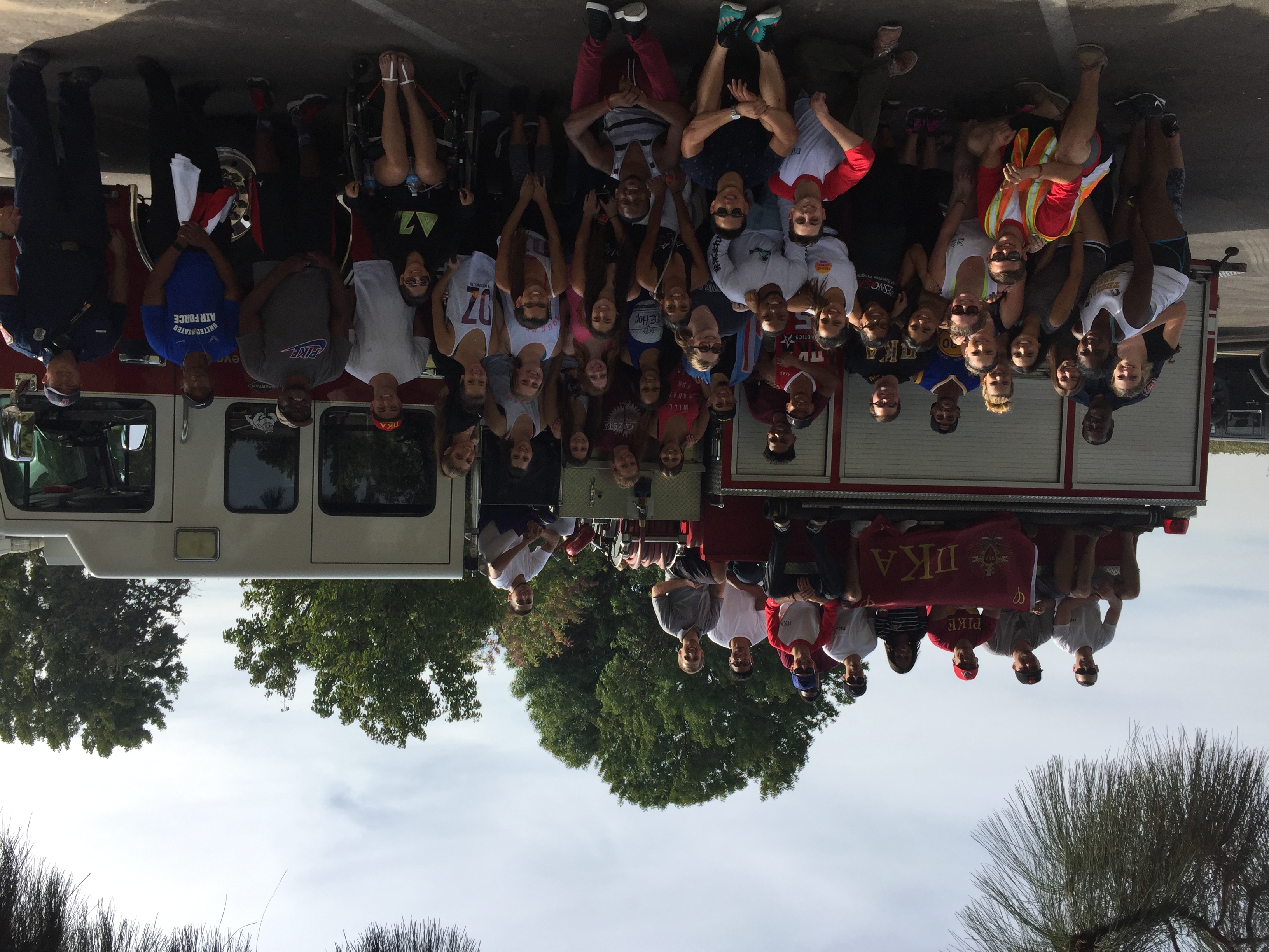 Iota Beta Chapter and Sorority Members With a Fire Truck Photograph