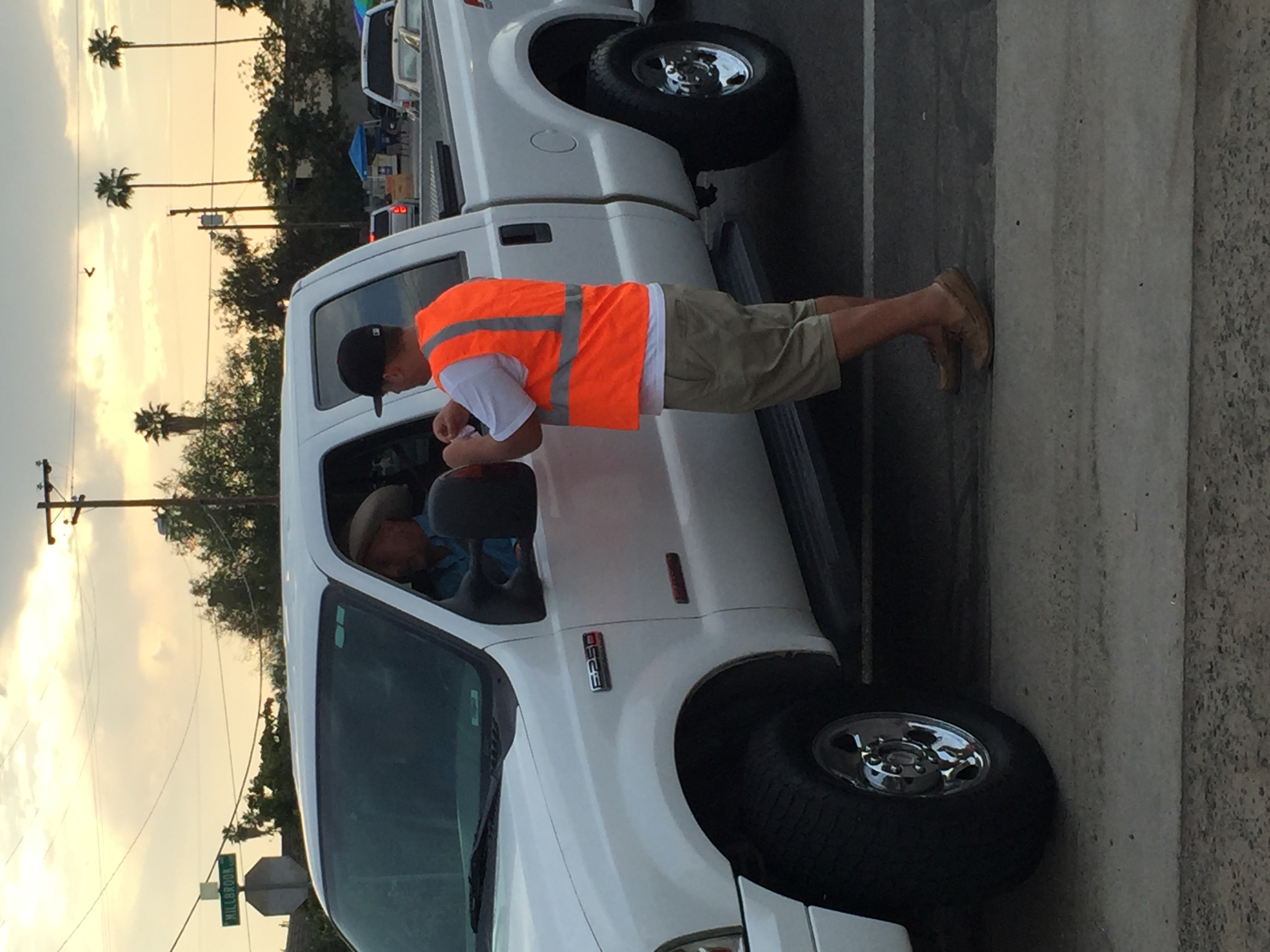 An Unidentified Pike Takes A Ticket From A Driver Photograph
