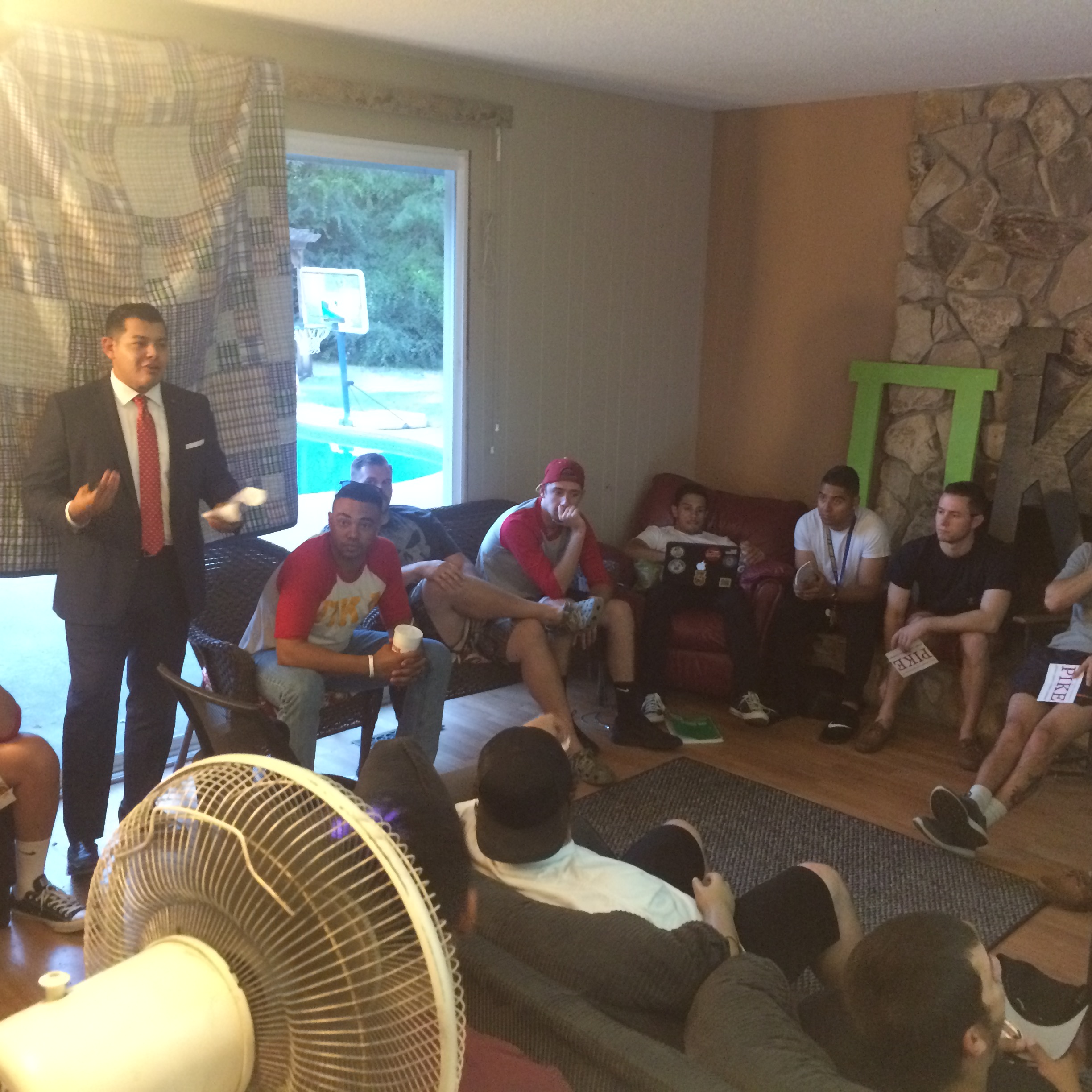 Theta Tau Chapter Members Listen to a Fraternity Brother Photograph