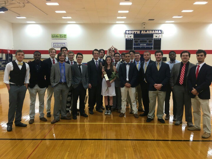 Eta Kappas with an Unidentified Woman Holding a Rose and Plaque Photograph