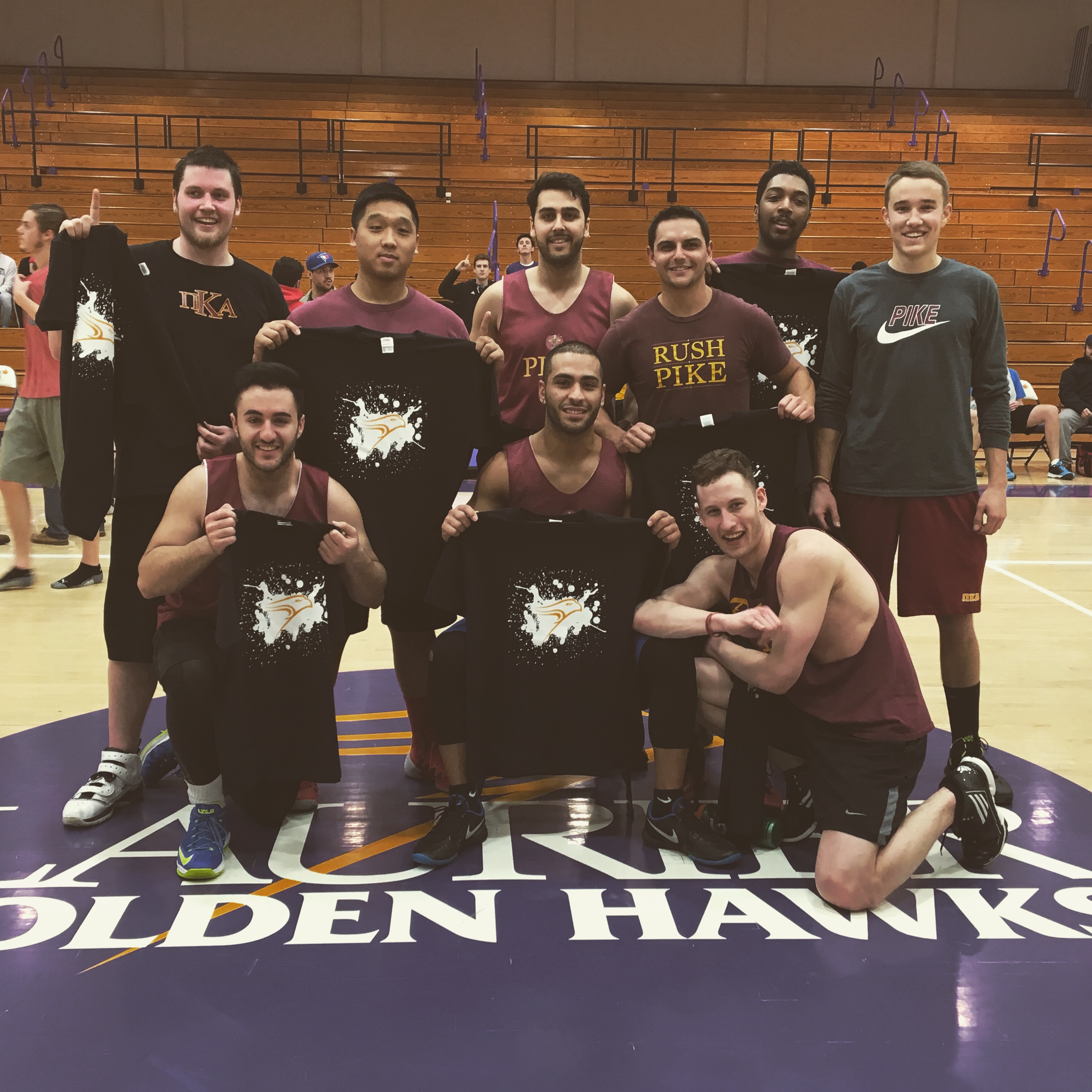 Nine Unidentified Kappa Mu Chapter Members Holding T-Shirts Photograph