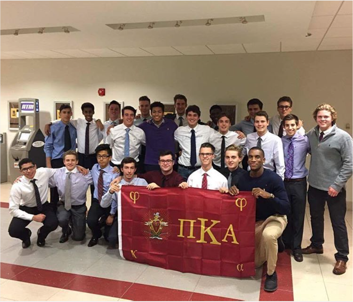 Kappa Mu Prospective Members with a PiKA Flag Photograph