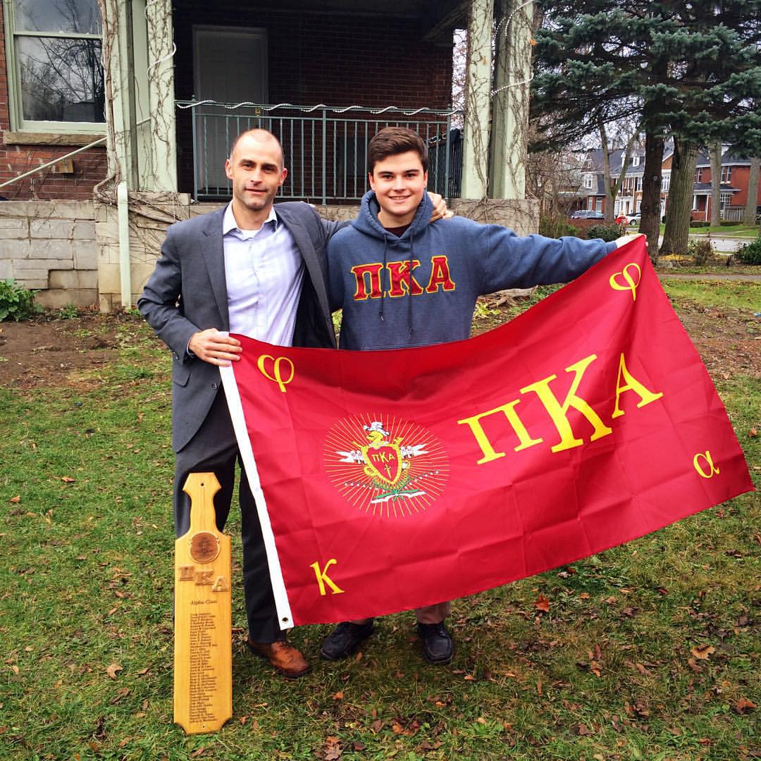 Two Unidentified Iota Omega Chapter Members with PiKA Paraphernalia Photograph