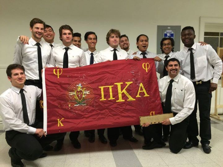 New Mu Delta Chapter Members with a PiKA Flag Photograph