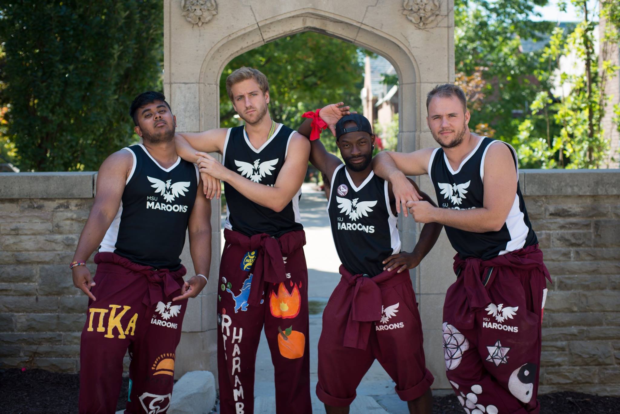 Four Mu Delta Chapter Members Wearing MSU Maroons Apparel Photograph