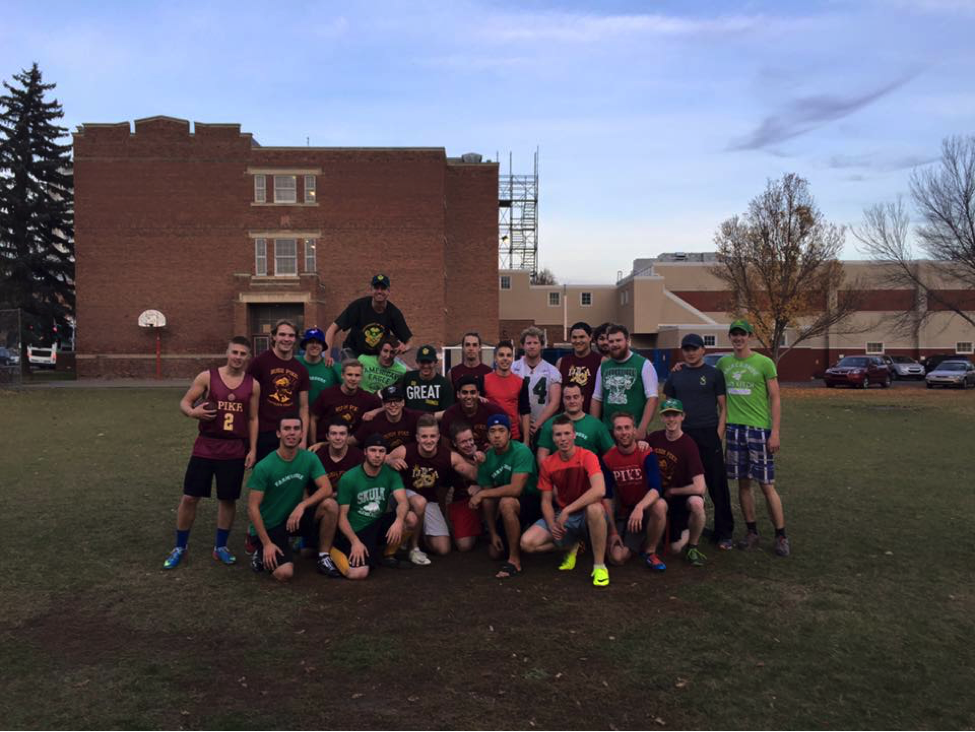 Lambda Epsilon Chapter Members and Others on a Field Photograph