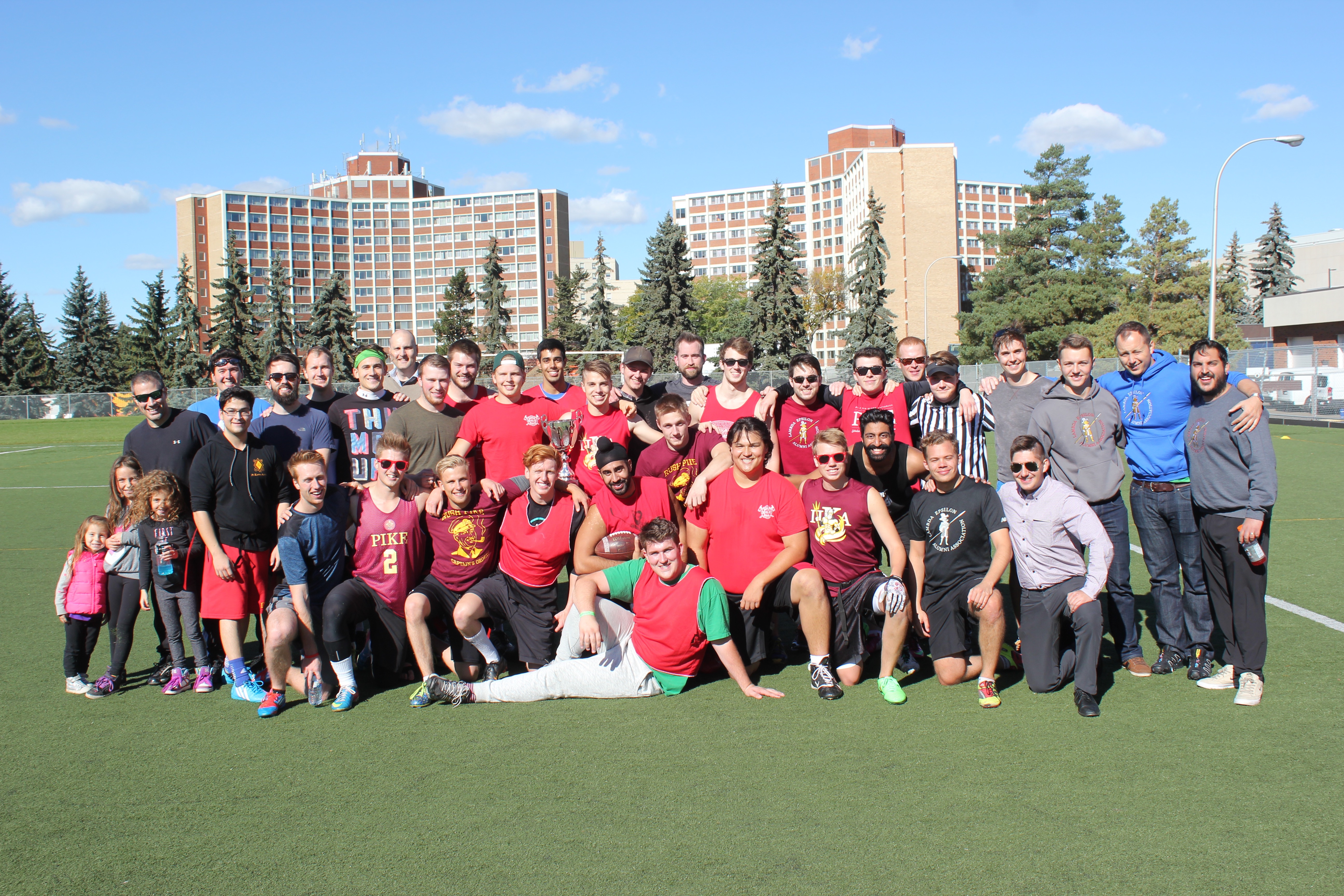 Lambda Epsilon Chapter Members on Soccer Field Photograph