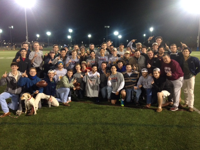 Theta Theta Chapter Members On An Athletic Field Photograph