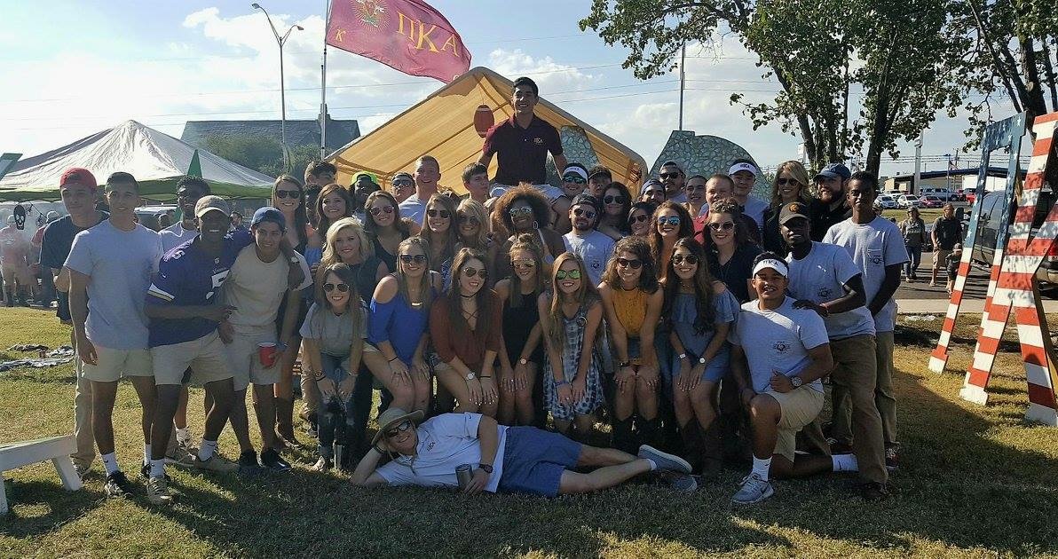 Theta Xi Chapter Pikes and Sorority Members At A Campus Event Photograph