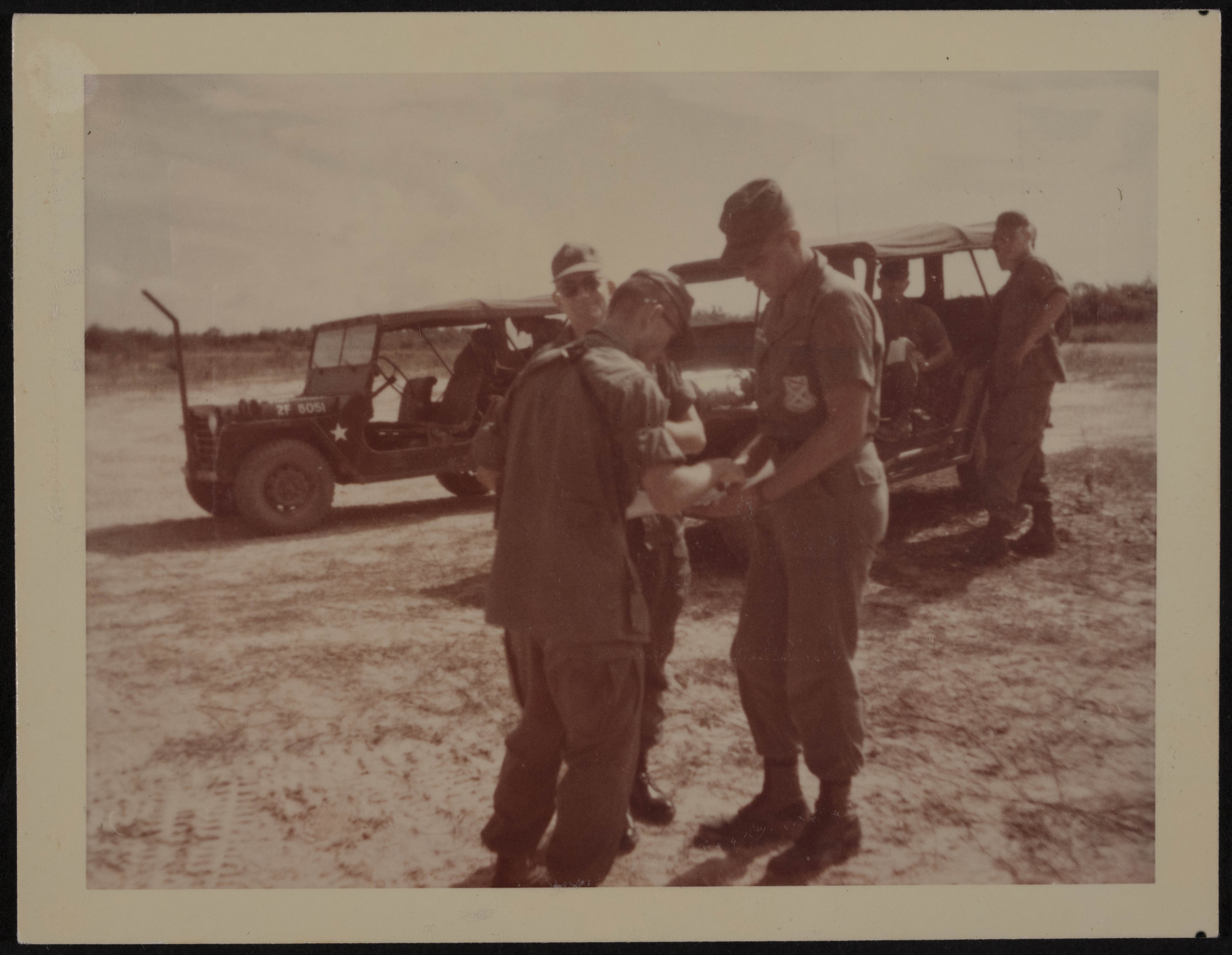 Paul Herbert Eklund Explaining the Defense Perimeter Photograph