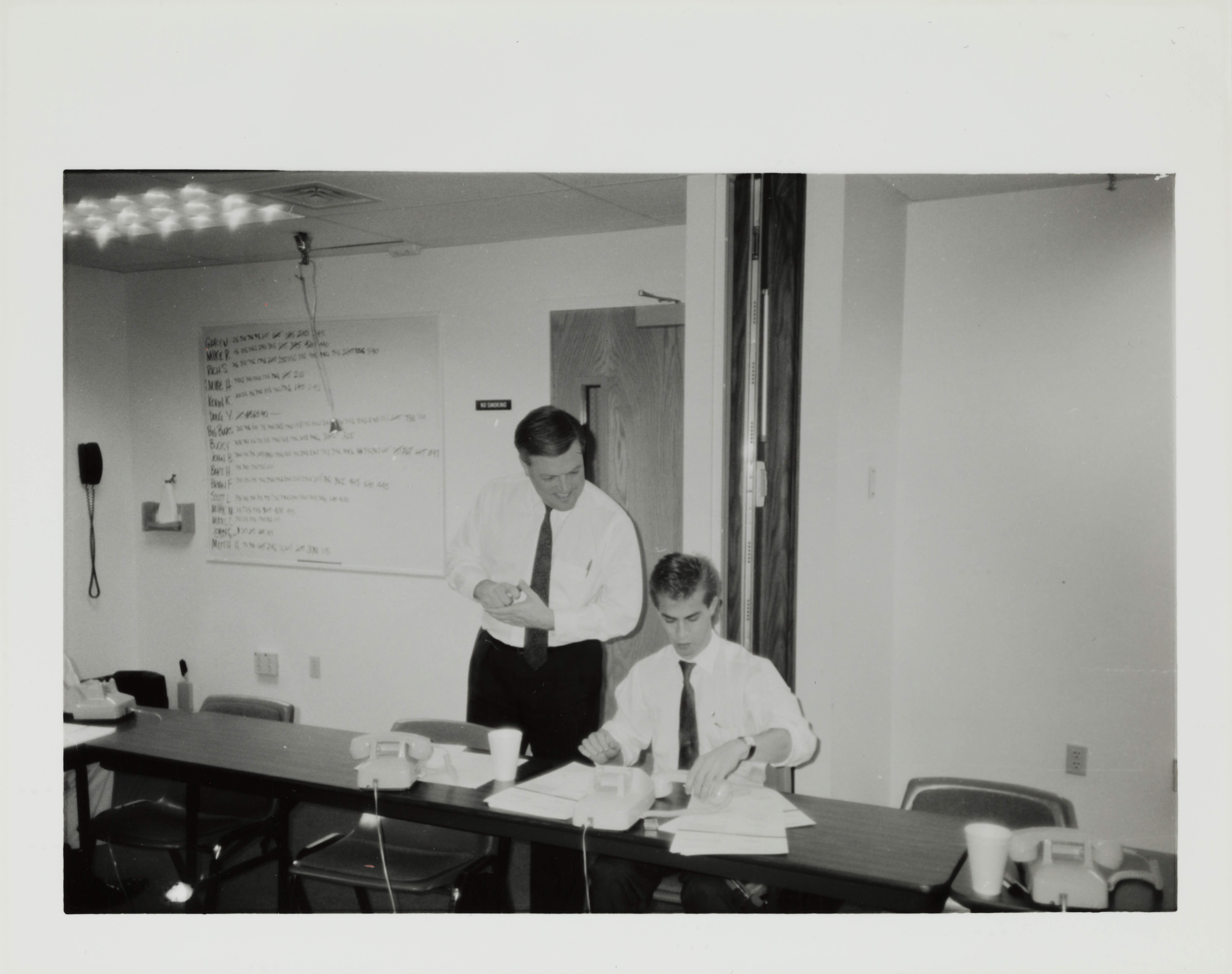 Man Looking Over Shoulder at Phone-A-Thon, October 23, 1989
