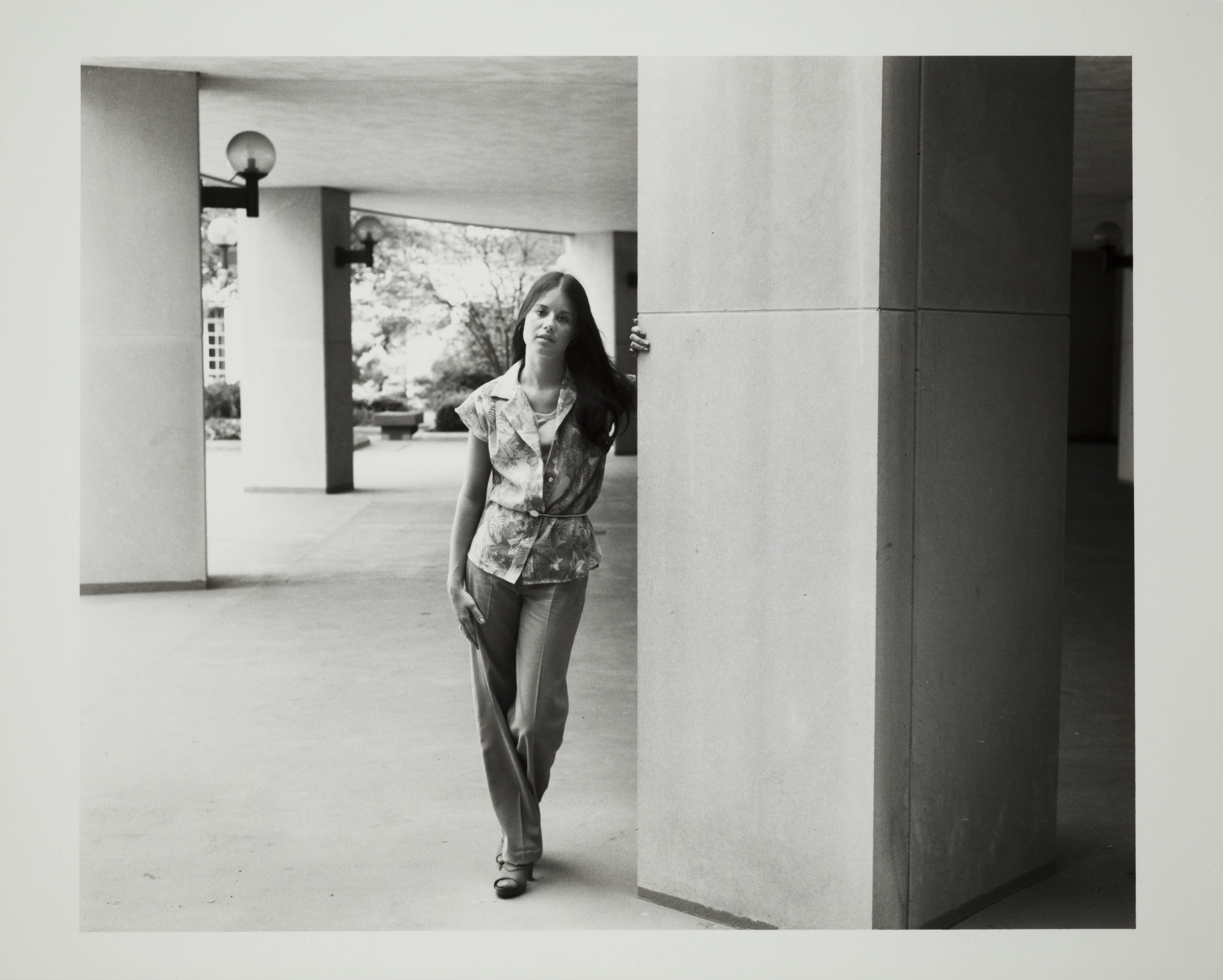 Unidentified Woman Beside Pillar Photograph