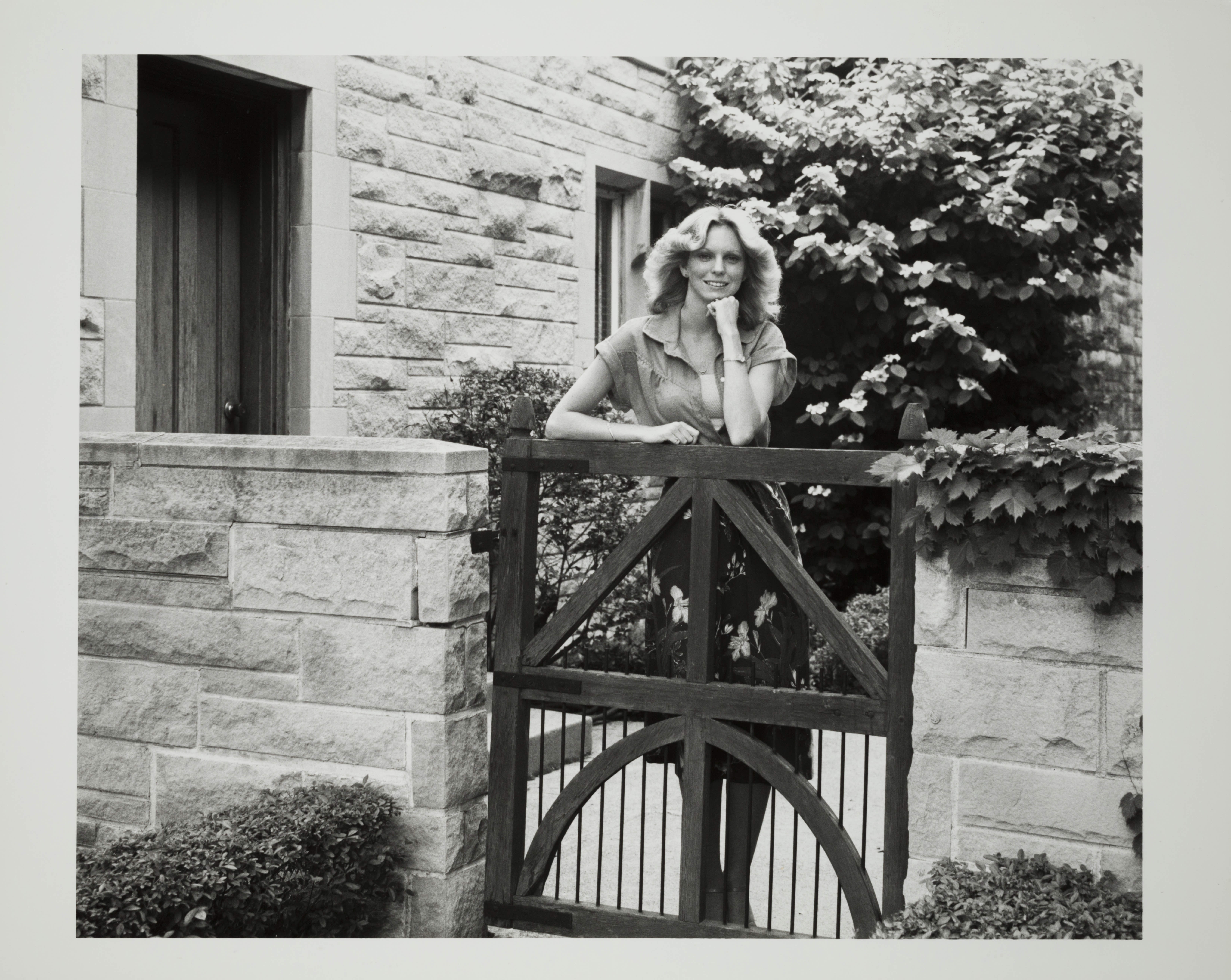 Unidentified Woman at Gate Photograph