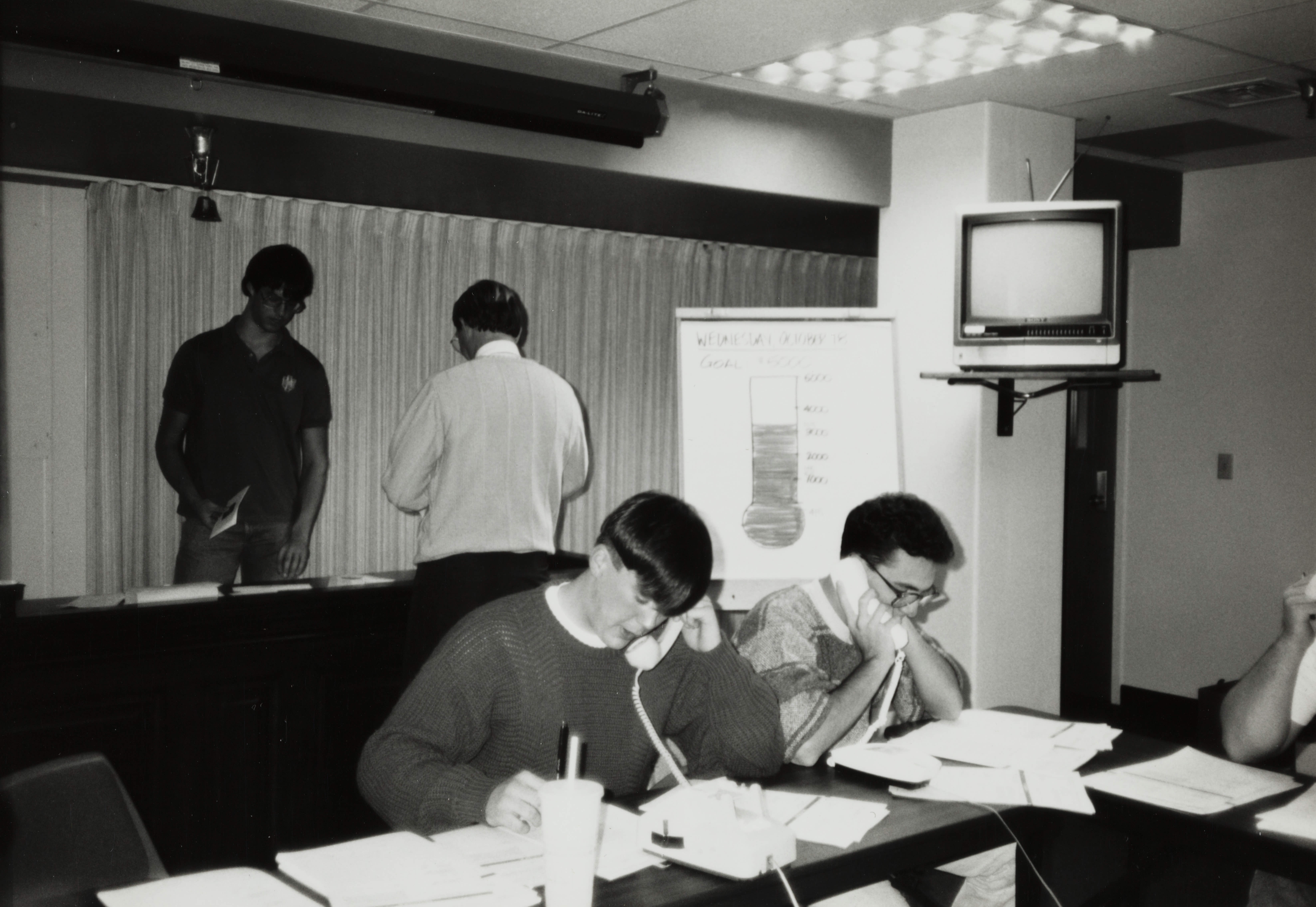 Theta Omicron Chapter Members on Phones at Phone-A-Thon Photograph 1, October 18, 1989