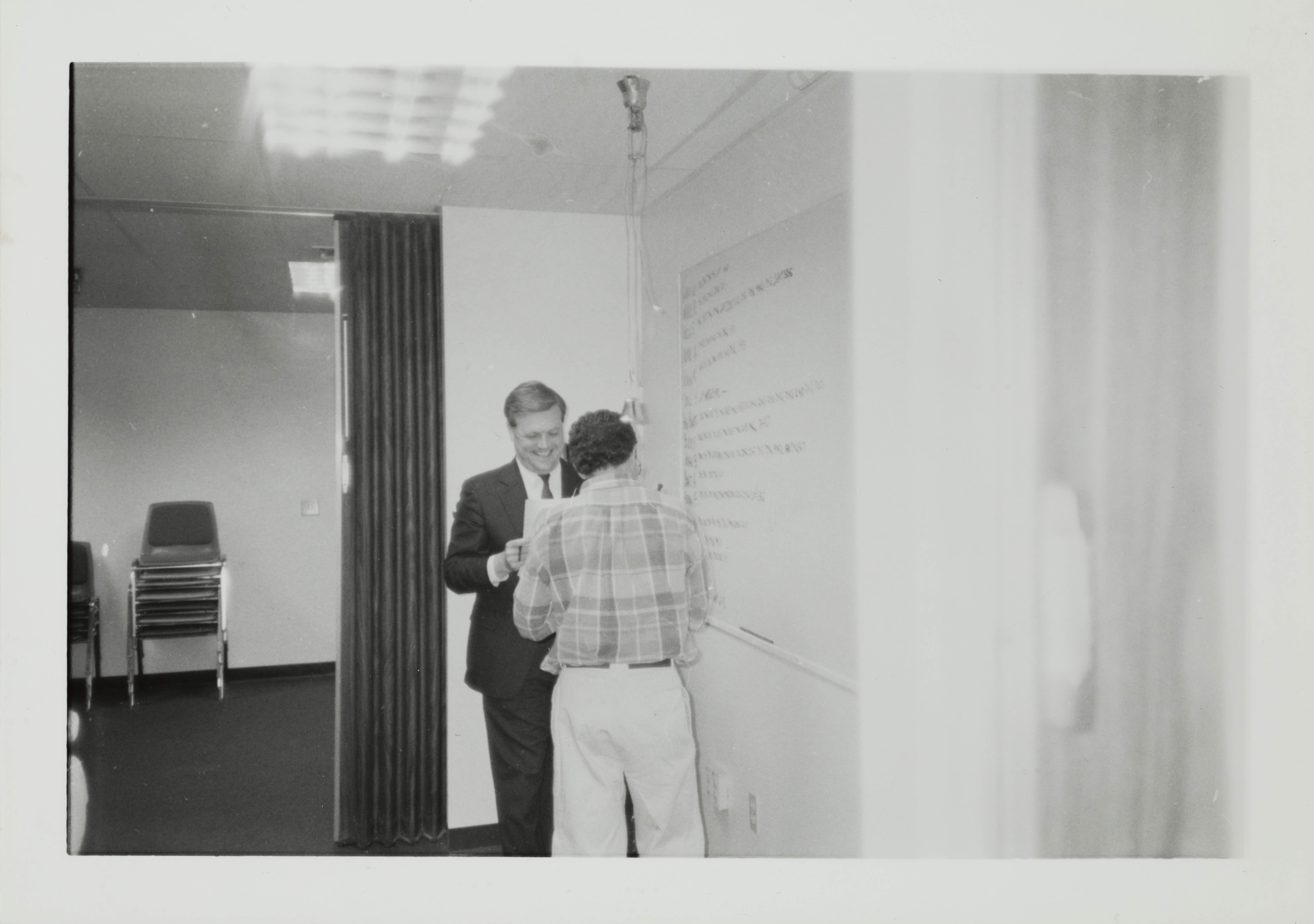 Theta Omicron Chapter Members at the Whiteboard Photograph, October 19, 1989